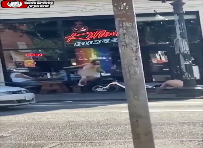 Video :In Portland, a man on a bike collides with a nude man